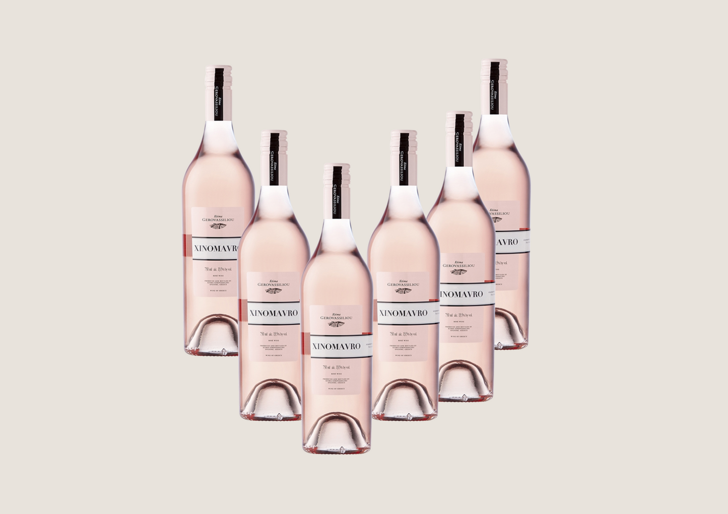 Sechs Flaschen Roséwein vor neutralem Hintergrund.